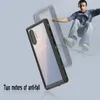 A person skateboarding in the background, with a phone case in the foreground. Produktbild-Vorschau