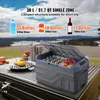 A portable cooler filled with bottles and fruit, set on a table outdoors with a scenic background. Náhled obrázku produktu