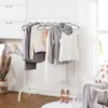Clothing on a garment rack. Náhled obrázku produktu