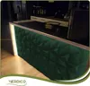 A dark-themed interior with a green textured bar counter and a wooden floor. Podgląd zdjęcia produktu