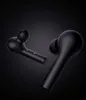 Two black wireless earbuds are shown against a dark background. Produktbild-Vorschau