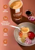 A can of Xucker Bronxe sweetener is shown next to a bowl of ingredients for a recipe, including chopped onions, chili flakes, herbs, and a dollop of sauce. Produktbild-Vorschau