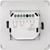 Close-up view of the back of a white wall-mounted electrical device, showing terminal connections and labeling. Produktbild-Vorschau