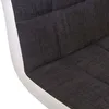 A close-up view of the textured fabric and white trim of a bar stool. Voir les images du produit