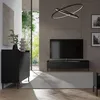 A modern living room with a black sideboard and TV. Produktbild-Vorschau