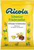 A yellow bag of Ricola Swiss Herbal Sweets, showing the product packaging and some of the herbs used in the sweets. Anteprima dell’immagine prodotto