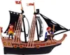 A toy pirate ship with two pirate figures on deck, set against a white background. Produktbild-Vorschau
