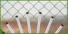 Several fence posts are shown in front of a chain-link fence. Produktbild-Vorschau