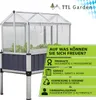 A greenhouse with lettuce growing inside, next to a green marketing panel. Produktbild-Vorschau