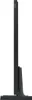 Side view of a black Samsung television on a stand, against a white background. Produktbild-Vorschau