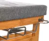 Close-up of a bamboo ironing board with a gray fabric cover and silver metal supports. Podgląd zdjęcia produktu