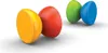 Four colorful, egg-shaped building blocks are arranged in two pairs on a white surface. Produktbild-Vorschau