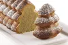 A Christmas tree shaped cake, dusted with powdered sugar, on a white platter. Produktbild-Vorschau