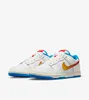 A pair of Nike Dunk Low Retro "Pop Art Sail Photo Blue" sneakers are shown against a white background. Produktbild-Vorschau