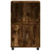 A tall, narrow cabinet with a rustic wood grain finish and two doors at the bottom. It has a shelf above the doors and a larger compartment above that. The cabinet is on wheels. Náhled obrázku produktu