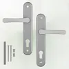A set of silver door handles and mounting hardware on a white background. Náhľad obrázku produktu