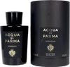 A black bottle of Acqua di Parma Sandalo Eau de Parfum and its cylindrical packaging are displayed against a white background. Voir les images du produit