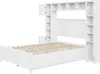 A white wooden bed frame with built-in shelving and drawers. Produktbild-Vorschau