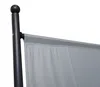 A close-up view of a gray fabric screen attached to a black pole. Produktbild-Vorschau
