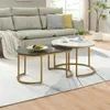 A living room setting with a sofa and nesting coffee tables. Produktbild-Vorschau