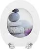 A toilet seat with a decorative image of stacked stones and a purple flower. Produktbild-Vorschau