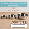 Three stainless steel pet bowls of varying sizes are displayed on a wooden surface, with cartoon dogs peeking over a bone-shaped graphic in the foreground. Produktbild-Vorschau