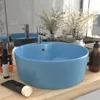 A light blue ceramic sink with a chrome faucet is displayed on a wooden countertop, with decorative dried flowers and toiletries in the background. Produktbild-Vorschau