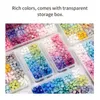 A collection of colorful wax beads in transparent storage boxes. Náhled obrázku produktu