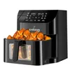 An air fryer filled with chicken wings, placed on a white background. Podgląd zdjęcia produktu