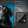 A smartphone with a camera lens protector and a dog wallpaper is shown. Produktbild-Vorschau