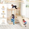 Children playing on a wooden indoor playground. Produktbild-Vorschau