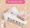 A set of baking piping tools and bags displayed on a light pink and white background with decorative illustrations. Anteprima dell’immagine prodotto
