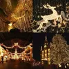A collage of four images showing Christmas lights in different settings: a tree covered in lights, a reindeer decoration, a street decorated with lights, and a church with a Christmas tree. Náhled obrázku produktu