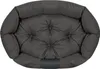 A top-down view of a dark gray, tufted dog bed with raised sides. Anteprima dell’immagine prodotto
