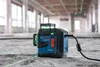 A Bosch laser level is shown on a construction site floor. Náhľad obrázku produktu