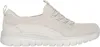 A side view of a single beige Skechers sneaker against a white background. Produktbild-Vorschau