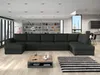 A modern living room with a large sectional sofa, coffee table, and rug. Náhľad obrázku produktu