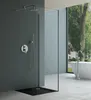 A modern bathroom with a walk-in shower and a freestanding bathtub. Produktbild-Vorschau