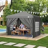 A family is enjoying a meal under a gray canopy in a backyard setting, with a swimming pool and a foosball table visible. Produktbild-Vorschau