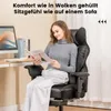 A woman is sitting in a black gaming chair and reading a magazine. Voir les images du produit
