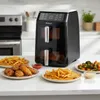 Heißluftfritteuse Dual Basket mit Pommes und Speisen – fettarmes Kochen ohne Öl – BOLKANI Produktbild-Vorschau
