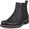 A black leather Chelsea boot is shown against a white background. Podgląd zdjęcia produktu