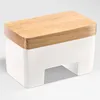 A white butter dish with a wooden lid on a white background. Podgląd zdjęcia produktu