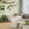 A child's bedroom with a white bed, toys, and decorations. Produktbild-Vorschau