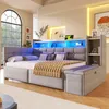 A modern bedroom with a grey upholstered daybed featuring blue LED lighting, a built-in shelf, and storage bench. A large arched window with a view of greenery is visible in the background. Produktbild-Vorschau