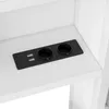A close-up view of a black power strip with two USB ports and two circular openings, embedded in a white surface. Produktbild-Vorschau