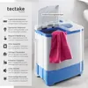 A mini washing machine with a pink towel draped over it, set against a light gray and white background. Text describes its features. Produktbild-Vorschau