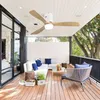 A modern outdoor patio with a sectional sofa, chairs, and a ceiling fan. Anteprima dell’immagine prodotto