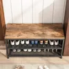 A shoe rack with shoes on it, placed in a hallway or entryway. Podgląd zdjęcia produktu