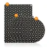 A stack of black and white geometric patterned induction hob covers. Anteprima dell’immagine prodotto